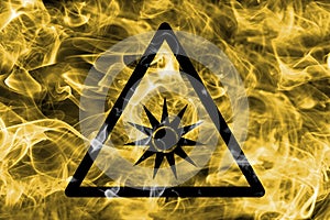 Optical radiation hazard warning smoke sign. Triangular warning