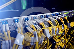 Optical server. Commutator. flashing lights. Optical fiber. Audio. Severs computer in a rack at the large data center. close-up,