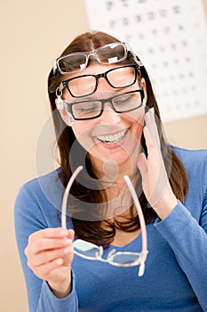 Optician client choose prescription glasses photo