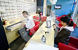 Optician and customer