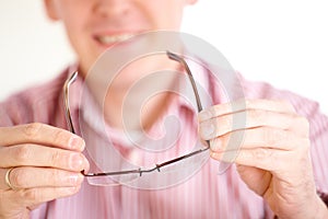 Optician presenting glasses