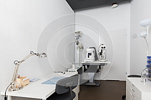 Optician`s office with medical equipment.