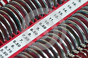 Optician with set of trial frames and trial lenses