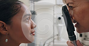 Optician, woman and checkup for vision, healthcare and eye exam with retinoscope test. Specialist, optometrist and