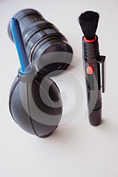 Optics and camera cleaning tool. Pear handle on a white background.