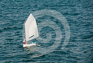 Optimist sailboat