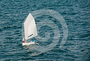 Optimist sailboat photo