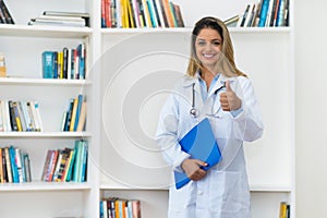 Optimistic blond female scientist researching for vaccine against coronavirus