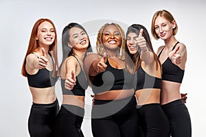 optimistic diverse models showing thumbs up