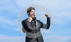 Optimistic mood. Success and luck. Being optimistic. Man bearded optimistic businessman wear formal suit sky background
