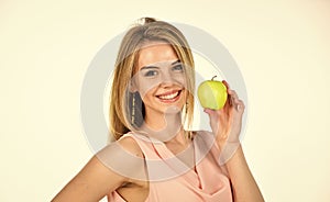 Optimistic woman. Healthy smile. Dentistry concept. Teeth whitening. Woman hold apple. Fresh and juicy snack. Girl live