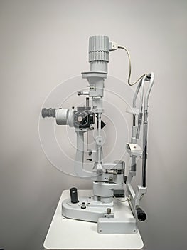 Optometrist Eye Exam Tool in Doctor`s Office photo