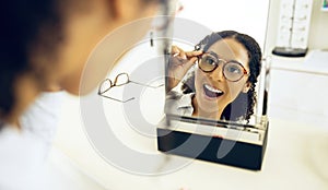 Optometry store, mirror and woman surprise over eyeglasses decision, optical clinic product or prescription eyewear