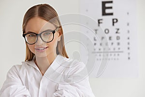 Optometry And Vision. Smiling Girl At Ophthalmologist Office