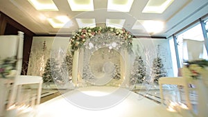 Opulent banquet hall decorated with flowers