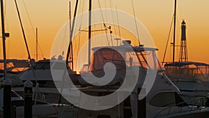 Opulent yachts peacefully berthed at a pier