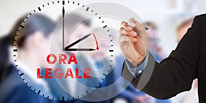 Ora Legale, Italian Daylight Saving Time, Business man hand writ photo