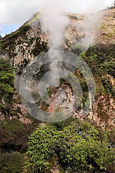 Orakei Korako hidden geothermal valley: View on steaming rocks Fumaroles