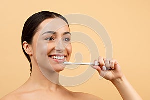 Oral Care. Closeup Portrait Of Young Indian Woman With Toothbrush In Hand