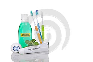 Oral care essential products tapered toothbrush, toothpaste, mouthwash, dental floss