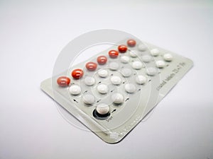 Oral contraceptive drug. 21 white pills consist of Ethinyl estradiol 0.035 mg. and Levonogestrel 0.15 mg. and 7 brown pill with
