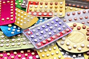 Oral contraceptive pill on pharmacy counter.