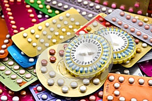 Oral contraceptive pill on pharmacy counter.