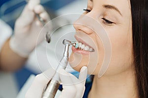 Oral hygiene, dentist doing Scaling and brushing procedure