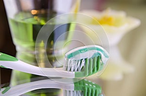 Oral hygiene products on a mirror surface