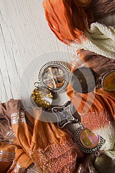 Orande cotton scarf on wooden background