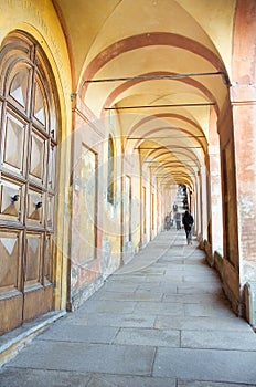 Orange arcades that lead to the sanctuary of San Luca in bologna