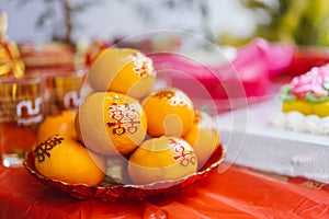 Orange with auspicious Chinese characters meaning double happiness. Auspicious fruit for Chinese wedding ceremonies