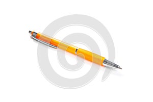 Orange ball-point pen isolated on white