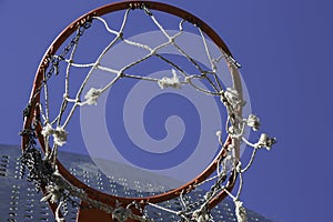 Orange Basketball hoop on blue sky