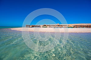 Orange Bay with white beach and crystal clear azure water - paradise coastline of Giftun island, Mahmya, Hurghada, Red Sea, Egypt