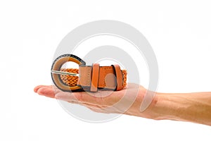 Orange belt roll for woman on hand