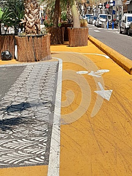 Orange bicycle path in Nice, France