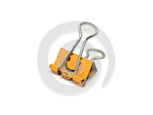 Orange binder clip isolate on white