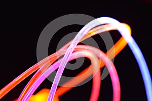 Orange and blue light wire, a light guide wire with different light transmission, light spectrum, and light effects located in a c