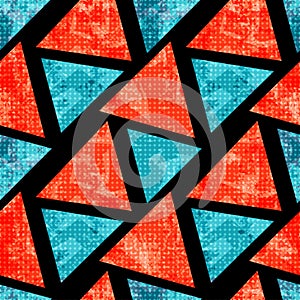 Orange and blue polygons on a black background. Geometric seamless pattern.