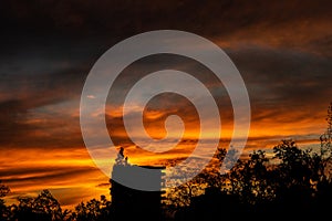 orange and blue skies on an autumn sunset in the city