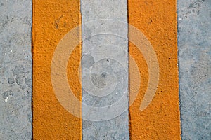 A orange both line on cement floor, texture and background design photo
