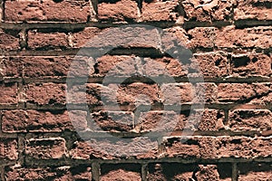 Orange brick wall texture background. Pattern of weathered old cracked brickwall