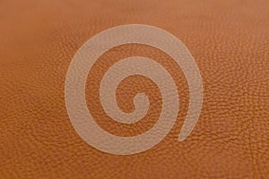 Orange-brown, orange grainy, heavy grain calf cow leather texture and background