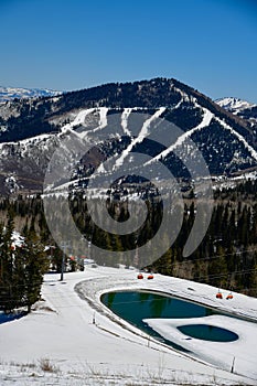Orange bubble chair lift at Park City Canyons Ski Area in Utah.
