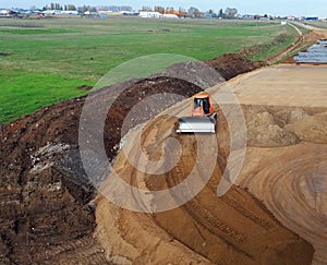 Orange bulldozer working