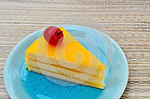 Orange cake in blue dish