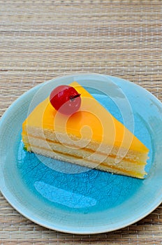 Orange cake in blue dish