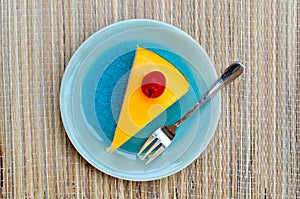 Orange cake in blue dish