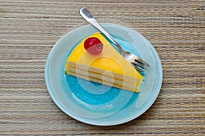 Orange cake in blue dish